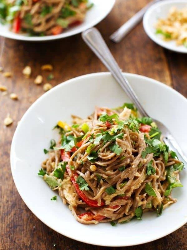 Spicy Peanut Chicken Soba Noodle Salad - colorful bell peppers with chewy soba noodles, shredded chicken, and a life changingly simple Spicy Peanut Sauce. Hot or cold, yumyumyum. 320 calories. | pinchofyum.com