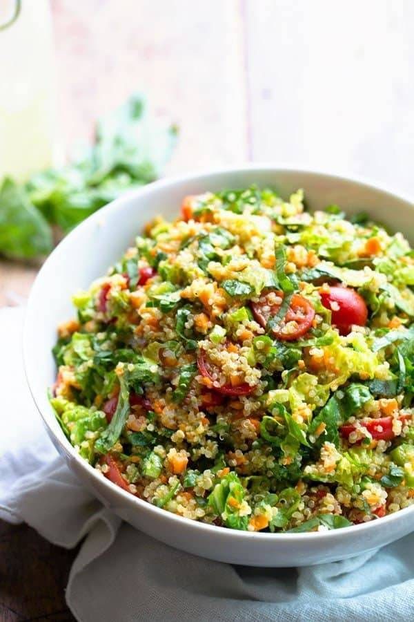 Herbed Quinoa Garden Veggie Salad in a white bowl.