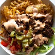 Burger bowls with house sauce.