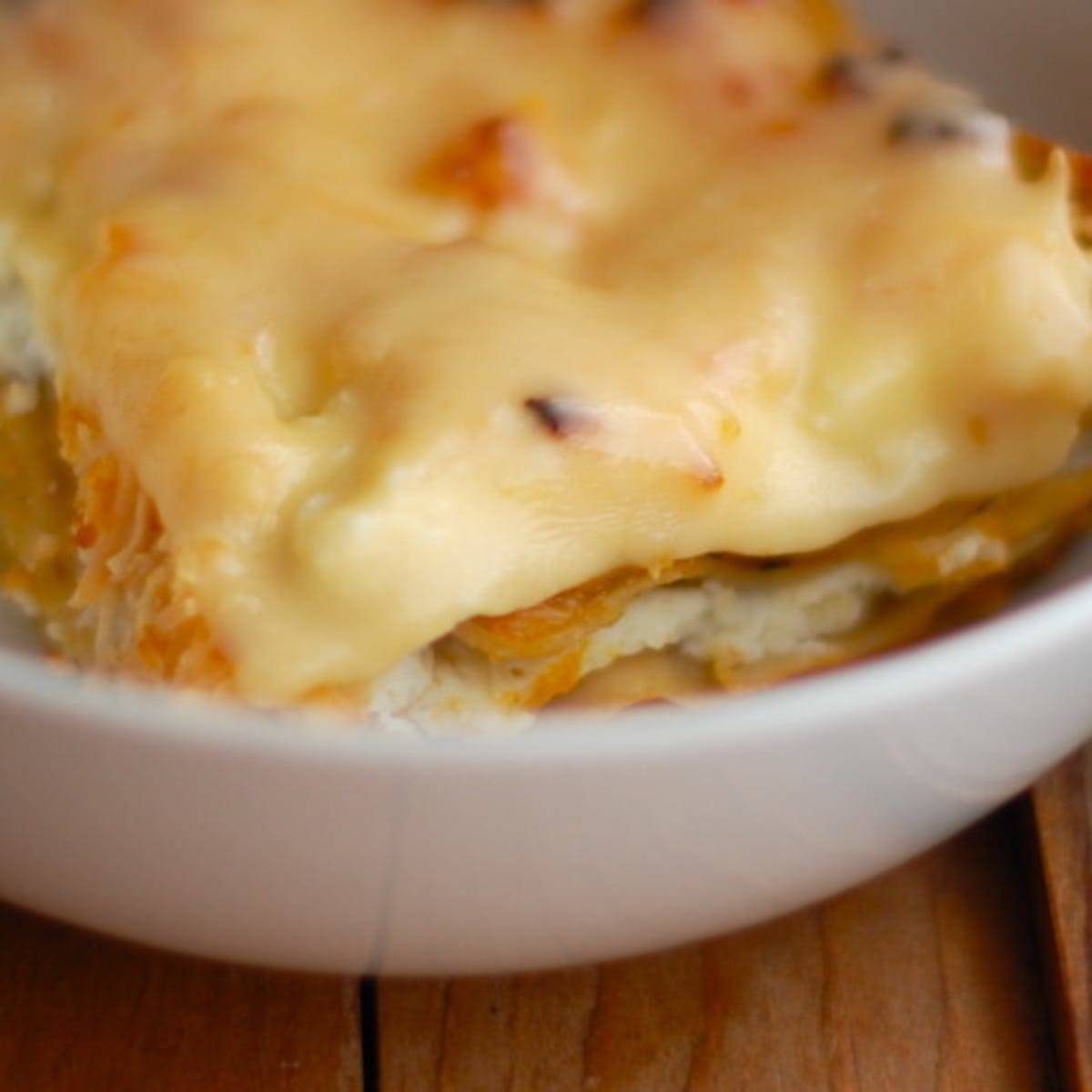 Butternut squash lasagna in a white bowl.