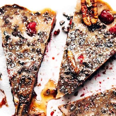 Chocolate Raspberry Almond Butter Bars on parchment paper.