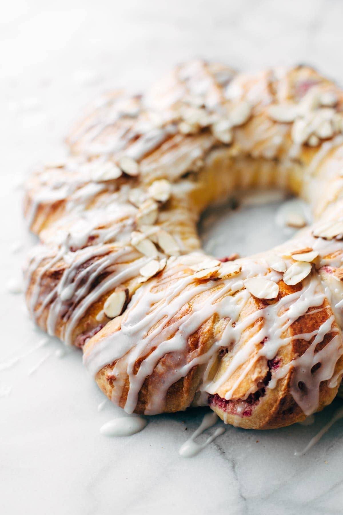 Christmas Tea Ring filled with Raspberry Cream Cheese Filling - the most beautiful Scandinavian-inspired recipe for holiday brunch! | pinchofyum.com Christmas Tea Ring filled with Raspberry Cream Cheese Filling - the most beautiful Scandinavian-inspired recipe for holiday brunch! | pinchofyum.com