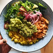 A picture of Crockpot Chicken Bowls with Yellow Rice and Cilantro Pesto