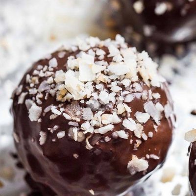Dark Chocolate Coconut Bites with coconut sprinkled on.