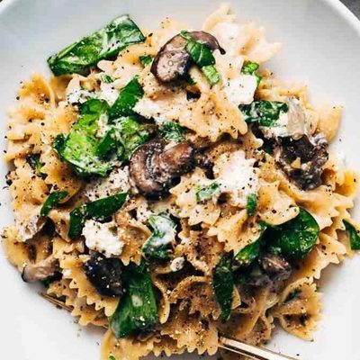 Mushroom Pasta with goat cheese in a bowl.