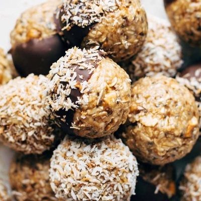 Peanut Butter Pretzel Energy Bites on parchment paper.
