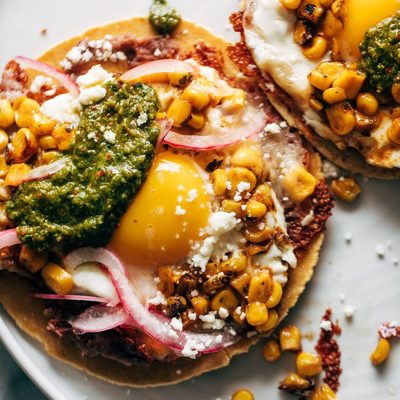 Fried egg tacos on a plate.