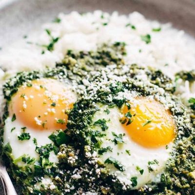 Green Shakshuka on a plate with rice.
