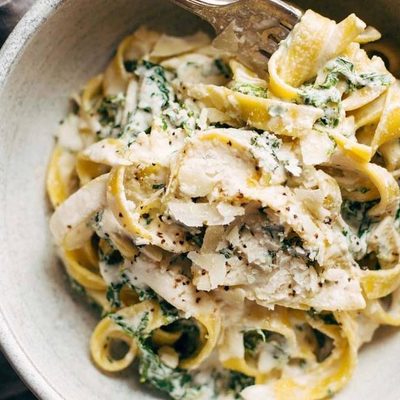Creamy Kale Pasta in a bowl with a fork.