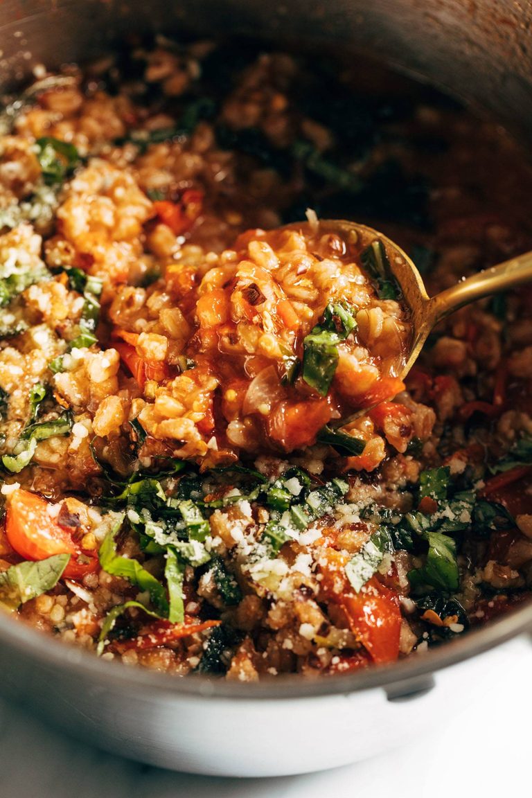 One-pan farro with tomatoes and kale.