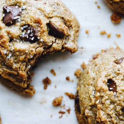 Peanut Butter Chocolate Chip Cookies on parchment paper.