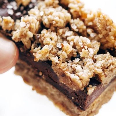 Salted Chocolate Snack Bar held by hand.