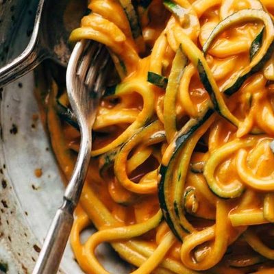 Roasted Red Pepper Pasta in a bowl with a fork.