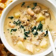 Sausage and white bean soup in a bowl.