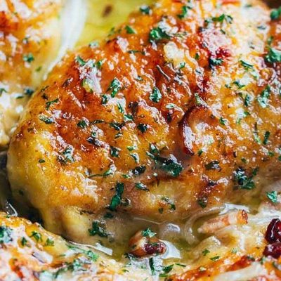 Skillet Chicken with Bacon and White Wine Sauce in a pan.