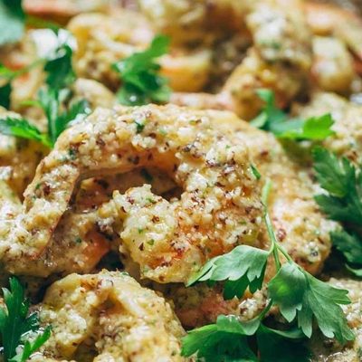 Spanish Shrimp with Garlic Bread Sauce in a pan with parsley.