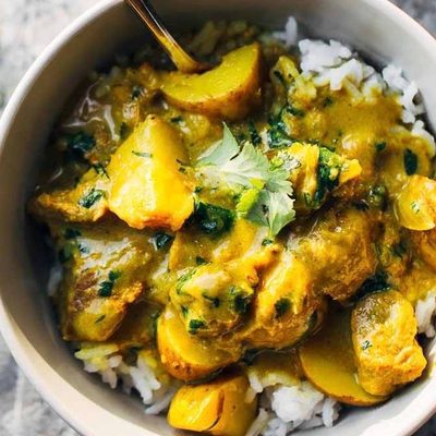 Thai Yellow Curry with Beef and Potatoes in bowls.